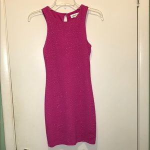 A pink sparkly mini dress